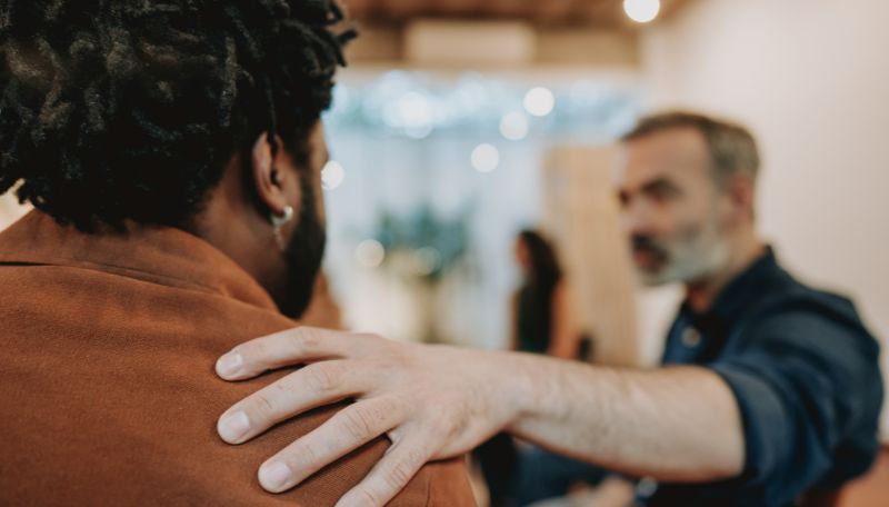 Therapist Supporting Client In A Counseling Session