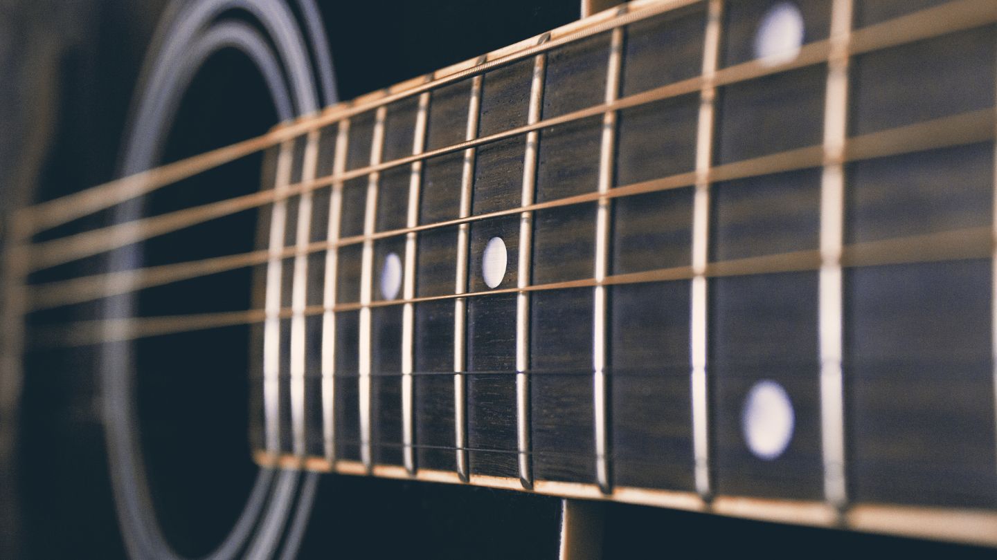Close-up Of Guitar Strings and Fretboard